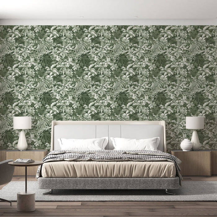 Une chambre élégante avec un papier peint floral vert et blanc, riche en feuillages luxuriants, créant une ambiance apaisante et naturelle.