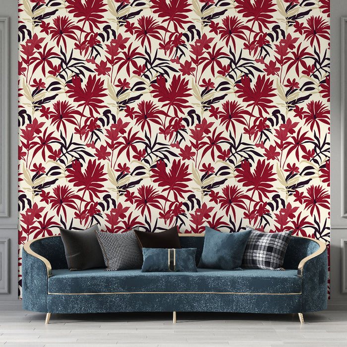 Un salon élégant avec un papier peint tropical aux motifs floraux rouges et noirs sur fond crème, créant une atmosphère chaleureuse et vivante.