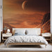 Une chambre moderne avec un papier peint représentant un paysage extraterrestre aux teintes orangées et rouges, évoquant une atmosphère futuriste et apaisante.