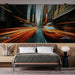 Une chambre moderne avec un papier peint dynamique représentant une vue floue de la ville, évoquant une ambiance urbaine et énergique.