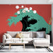 Un salon contemporain avec un papier peint représentant une grande vague stylisée turquoise sur fond rouge, créant une ambiance dynamique et artistique.