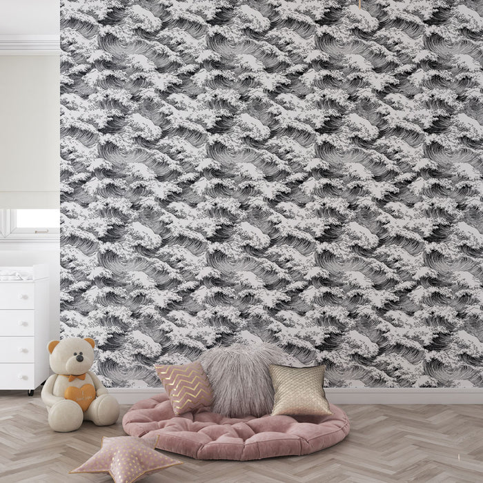 Une chambre douce avec un papier peint en noir et blanc représentant des vagues stylisées, créant une ambiance artistique et apaisante.