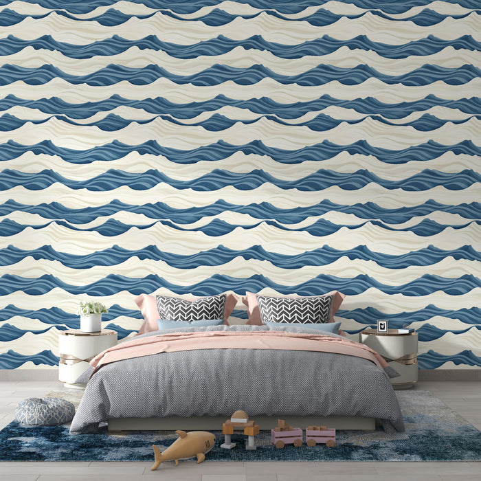 Une chambre moderne avec un papier peint aux motifs de vagues bleues et crème, créant une ambiance apaisante et inspirante.