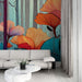 Un salon moderne avec un papier peint illustrant des champignons colorés sur fond de forêt, créant une ambiance artistique et vivante.