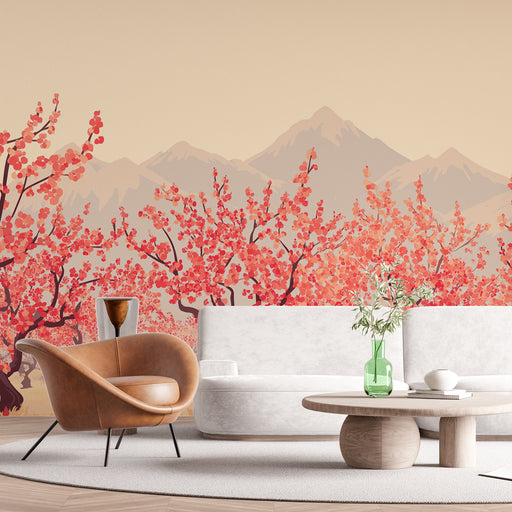 Un salon contemporain avec un papier peint représentant des cerisiers en fleurs aux teintes rouges et orangées, créant une ambiance chaleureuse et apaisante.