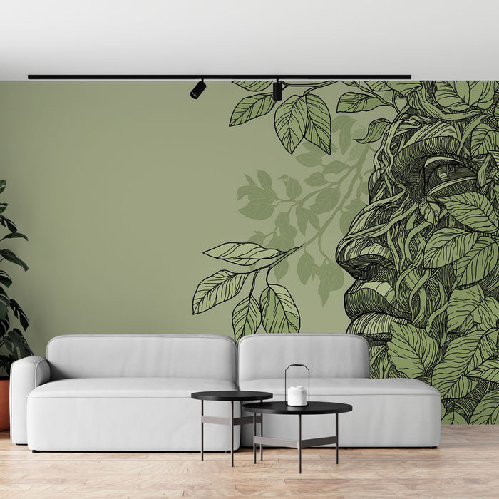 Un salon moderne avec un papier peint représentant un visage stylisé entrelacé de feuilles sur un fond vert doux, créant une ambiance naturelle et apaisante.