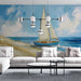Un salon moderne avec un papier peint représentant un voilier sur fond bleu clair, évoquant une atmosphère paisible et maritime.