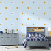 Papier peint bleu avec motifs dorés en forme de lion pour chambre d'enfant moderne.