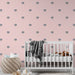 Papier peint rose avec motifs éléphants gris pour chambre bébé moderne